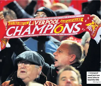  ?? Mike Egerton ?? > Liverpool need just two more wins to land the title