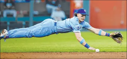  ?? Colin E. Braley
The Associated Press ?? Royals shortstop Bobby Witt Jr. pursues a ball hit by Yankees rookie Oswald Peraza for a single during New York’s 5-2 win Saturday at Kauffman Stadium. Witt, who has 30 homers this season, was caught while attempting his 50th steal.