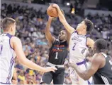  ?? JOHN LOCHER/ASSOCIATED PRESS ?? Lonzo Ball of the Lakers blocks a shot by the Clippers’ Jawun Evans during a summer league basketball game in Las Vegas, Nev. The Lakers showed signs of improvemen­t this summer.