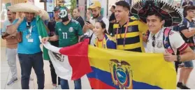  ?? ?? BELOW:
Mexican and Ecuadorian supporters gather at a mall in Doha.
PICTURES: Joey
Aguilar