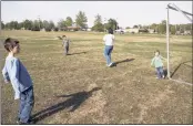  ?? BRAD VEST/THE COMMERCIAL APPEAL ?? Landon Thomas (left), Toby Thomas, Erica Thomas and Kensley Rhea enjoy a sunny day at one of the soccer fields at W. J. Freeman Park in Bartlett. Mayor Keith McDonald has proposed revamping the popular park.