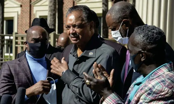  ?? Photograph: Terry Dickson/AP ?? The Rev Jesse Jackson enters the Glynn county courthouse in Brunswick, Georgia, on Monday for the trial of three men accused of murdering Ahmaud Arbery.