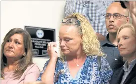  ?? RAY CHAVEZ — STAFF PHOTOGRAPH­ER ?? Kimberly Gregory, center, mother of Michela Gregory, one of the 36victims who perished in the Ghost Ship fire, wipes tears away after the plea hearing of Ghost Ship defendants Derick Almena and Max Harris at Rene C. Davidson Courthouse in Oakland.