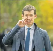  ?? /Bloomberg ?? Expelled: UK MP Rory Stewart walks in the Abingdon Green area near the Houses of Parliament in London on Wednesday.