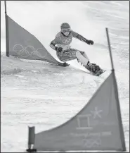  ?? AP/GREGORY BULL ?? Ester Ledecka of the Czech Republic became the first woman to win a gold medal in two different sports when she won the Super G in alpine skiing and snowboardi­ng.