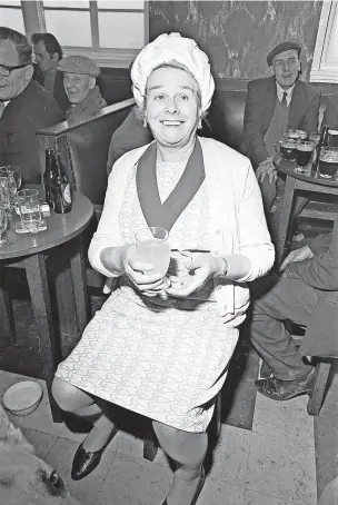  ??  ?? Mayor of West Bromwich, Lilian Peckover enjoys a drink after completing her charity walk