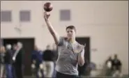  ?? MARGARET BOWLES — ASSOCIATED PRESS ?? University of Wyoming quarterbac­k Josh Allen passes during his pro day drills March 23 in Laramie, Wyo.