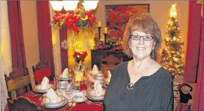  ?? MILLICENT MCKAY/JOURNAL PIONEER ?? Paula Arsenault of Mont-Carmel has opened her home for Christmas house tours for three years. But there is one stipulatio­n: tour participan­ts must bring a non-perishable food item that will later be donated to a family in need.