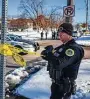  ?? Zach Boyden-holmes / AP ?? Police investigat­e a shooting Monday afternoon outside East High School in in Des Moines, Iowa. One person was killed and two others were critically hurt.