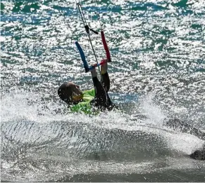  ??  ?? Flaccovio, co-manager of the Tsunami Kitesurf school in Ladispoli, enjoying his kitesurfin­g session in the Tyrrhenian sea in Ladispoli, Italy. — aFP