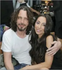  ??  ?? Chris Cornell, left, and his wife, Vicky Karayianni­s Cornell, in April 2012.