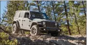  ?? PHOTO COURTESY OF STELLANTIS ?? A 2021Jeep Wrangler 4xe from a company test drive. About 32,000 Wrangler 4xe plug-in hybrids have been recalled due to a battery that can catch fire, even while not in use.