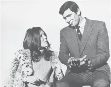  ?? BOB DEAR/AP 1969 ?? Actors George Lazenby and Diana Rigg during takes of the film “On Her Majesty’s Secret Service.”