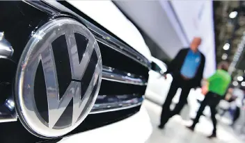  ?? JOHN MACDOUGALL/AFP/GETTY IMAGES ?? Volkswagen will pay the 105,000 Canadian owners and lessees of 2-litre Volkswagen and Audi diesel vehicles between $5,100 and $8,000 each in damages.