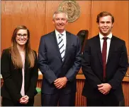  ?? PHOTO COURTESY MONTGOMERY COUNTY DISTRICT ATTORNEY’S OFFICE ?? Anne O’Connell, left, and Bradley Deckel, right, pictured here with Montgomery County District Attorney Kevin R. Steele were the winners of the district attorney’s 21st Annual Summer Intern Mock Trial Competitio­n for secondyear law students.