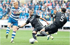  ??  ?? Pulling level: defender Paul McShane strikes to earn Reading a point yesterday