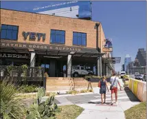  ?? JAY JANNER / AMERICAN-STATESMAN 2017 ?? Looking to take advantage of its popularity, Yeti opened a flagship retail store on South Congress Avenue last year. The store also features a popular bar.