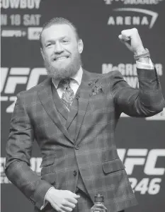  ??  ?? Conor McGregor motions to the crowd during a news conference for a UFC 246 mixed martial arts bout in Las Vegas. McGregor is scheduled to fight Donald “Cowboy” Cerrone in a welterweig­ht bout Saturday ASSOCIATED PRESS