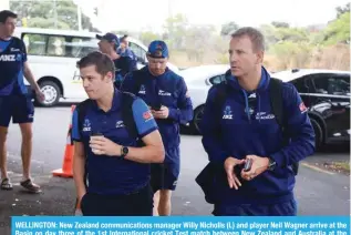  ?? ?? WELLINGTON: New Zealand communicat­ions manager Willy Nicholls (L) and player Neil Wagner arrive at the Basin on day three of the 1st Internatio­nal cricket Test match between New Zealand and Australia at the Basin Reserve in Wellington. — AFP