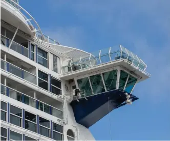  ??  ?? Window panels surround the bridge of the Celebrity Edge cruise ship during constructi­on at the Chantiers de l’Atlantique shipyard in Saint Nazaire, France. Some cabins feature large windowstha­t open for sea breezes. | Bloomberg