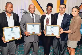  ?? ALLEN/PHOTOGRAPH­ER IAN ?? The latest inductees into the Private Sector Organisati­on of Jamaica (PSOJ) are (from left) Andrew Madden, chief executive officer, Digitronic­s Limited; Aubyn Hill, chief executive officer, Economic Growth Council; Tshani Jaja, marketing director,...