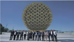  ?? Scottish Developmen­t Internatio­nal ?? Scottish space industry delegates and speakers outside the UK pavilion at Expo 2020 Dubai, where they unveiled Scotland’s new space strategy