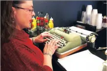  ?? PICTURE: REUTERS ?? Andrea Kittle, of Albuquerqu­e, tries out a vintage Smith Corona electric typewriter at a ‘type-in’.