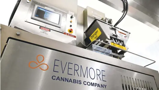  ?? LLOYD FOX/BALTIMORE SUN PHOTOS ?? An automated depositor that will make medical marijuana lozenges at the Evermore Cannabis Company’s edible kitchen, which is being set up.