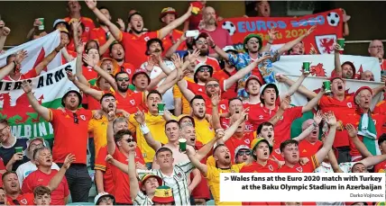 ?? Darko Vojinovic ?? Wales fans at the Euro 2020 match with Turkey at the Baku Olympic Stadium in Azerbaijan