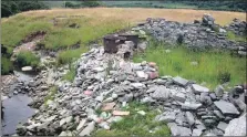  ??  ?? The ruins of the Catacol barking house where two vats can be seen.