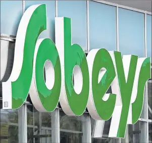  ?? ANDREW VAUGHAN/THE CANADIAN PRESS ?? A Sobeys grocery store is seen in Halifax on Sept. 11, 2014. The Sobeys grocery business will be cutting about 800 office jobs across Canada.