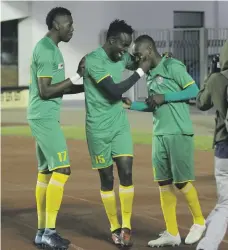  ?? EPA ?? Zimbabwe striker Khama Billiat, right, celebrates with teammates after scoring against DR Congo on Tuesday