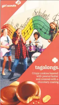  ??  ?? Girl Scout Samira Tanko, of Stratford, is pictured playing drums, on a box of cookies.