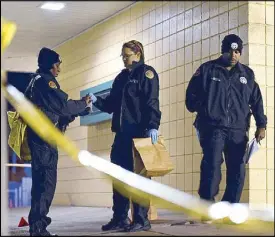  ?? AFP ?? Police collect evidence after a shooting at a playground in New Orleans, Louisiana Sunday.