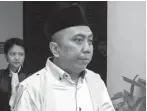  ?? AKHMAD RIZAL/JAWA POS ?? TERIMA DAKWAAN: Subiyanto setelah menjalani sidang pertama kasus penggelapa­n yang dilakukann­ya.