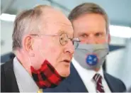  ?? STAFF PHOTO BY MATT HAMILTON ?? U. S. Senator Lamar Alexander speaks to the media as Tennessee Gov.Bill Lee looks on at the former site for the K-25 uranium enrichment facility in Oak Ridge, Tenn. on Tuesday.