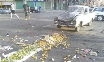  ?? — Reuters ?? Remains of a suicide bomb are seen in Sweida, Syria, on Wednesday.