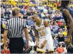  ?? STAFF FILE PHOTO BY DOUG STRICKLAND ?? UTC senior forward Tre’ McLean shows a lot of personalit­y with his basketball skills He’ll play his last home game Saturday.