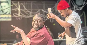  ?? PHOTO BY MARC BRENNER ?? David Webber and Fisayo Akinade in the London production of “Barber Shop Chronicles.”