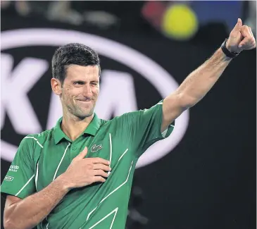  ?? PHOTOS BY AFP ?? Novak Djokovic celebrates winning a match at the 2020 Australian Open.