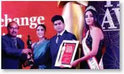  ??  ?? The award was given to Greynomad and, received by Tanisa Mookerji, Manager - Marketing and Rishav Jana, Manager - Business Developmen­t &amp; Operations