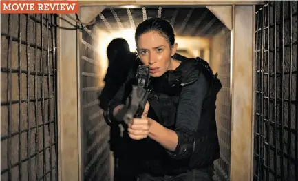  ?? Lionsgate ?? Emily Blunt stars as Kate, the junior member of a team fighting the drug war, in the consistent­ly impressive “Sicario.”