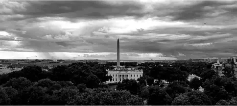  ??  ?? Storm clouds over the White House. — WP-Bloomberg photo