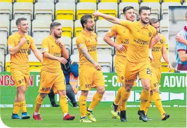  ??  ?? Craig Halkett celebrates. Right: Kenny Miller and Scott Pittman at full-time.