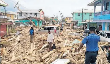  ?? GETTY IMAGES/FILE ?? The Caribbean island of Dominica, already reeling from Irma, was devastated by Hurricane Maria in September.