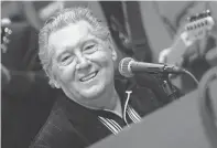  ?? DIMA GAVRYSH/AP FILE ?? Jerry Lee Lewis performs onstage in New York in 2006. Spokespers­on Zach Furman said Lewis died Friday at his home in Memphis, Tenn.