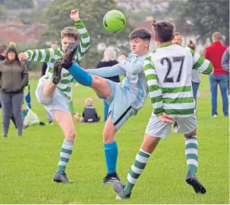  ??  ?? There was no holding back as Celtic Boys and East Craigie Swifts fought out a goalless draw in the U/16 Maryfield League at Lochee Park.