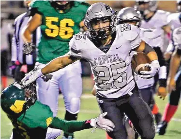  ?? EDDIE MOORE/JOURNAL ?? Capital High School’s Luke Padilla is the school’s leading rusher, having accumulate­d more than 4,000 yards during his COVID-shortened prep career.