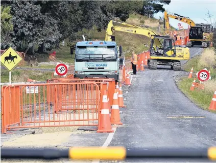  ?? PHOTO: PETER MCINTOSH ?? Water works continue . . . Constructi­on crews work on the installati­on of a new water pipeline in Waikouaiti.