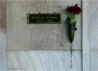  ??  ?? LEFT: Marilyn Monroe’s final resting place at Westwood Village Memorial Cemetery, where she has supposedly manifested as an ectoplasmi­c blob. Hugh Hefner bought the adjacent tomb in 1992 so that he could spend eternity beside her.